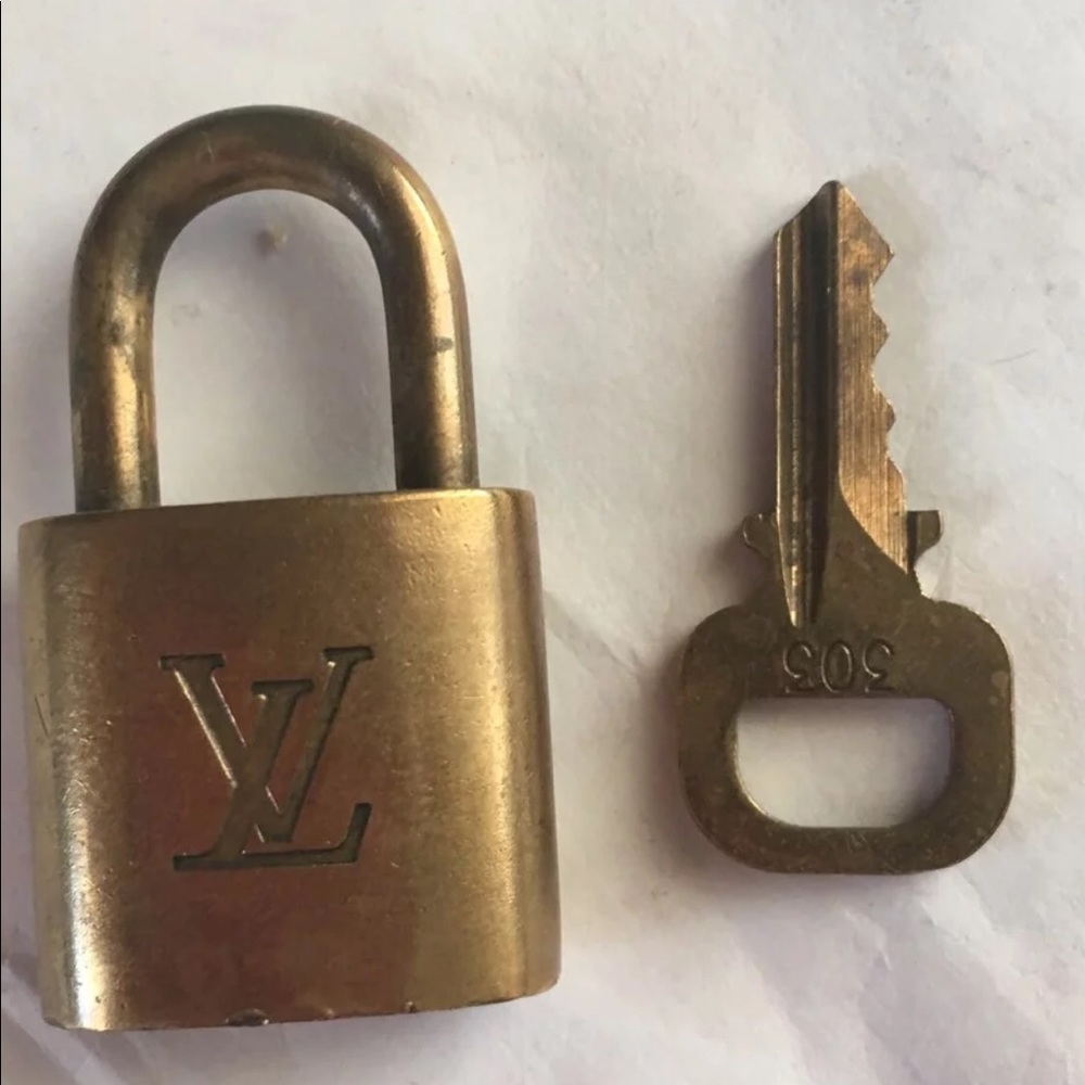 Authentic Louis Vuitton lock n key 303